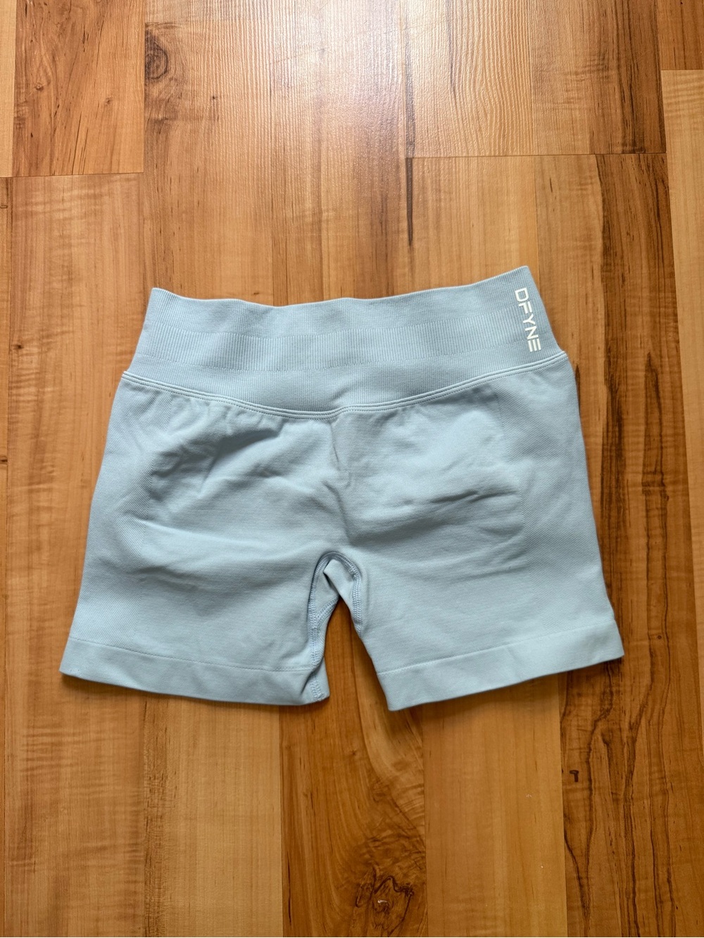 Ice blue dfyne impact 4.5” short size small